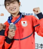 Opening Ceremony 2026 Ami Nakai Orange Jacket